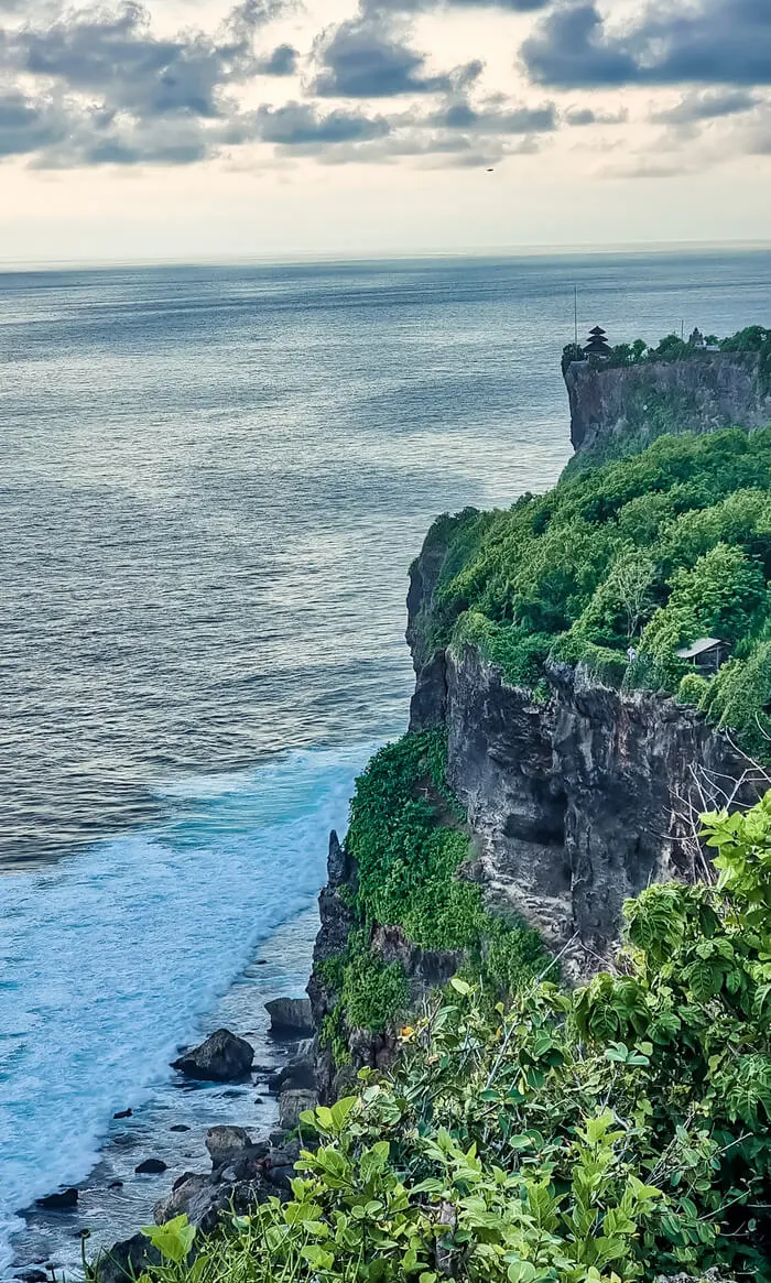 Uluwatu Temple in Bali from Karang Boma Cliff viewpoint