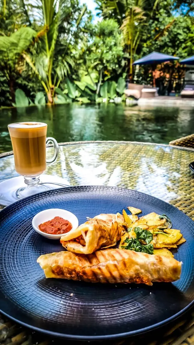 sebatu sanctuary eco resort ubud bali breakfast at swimming pool